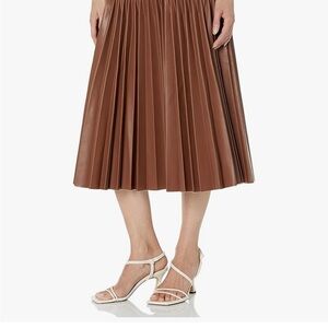 BCBG Elegant Brown Faux Leather Pleated Skirt
NEW!  Tags attached!  NEVER WORN!